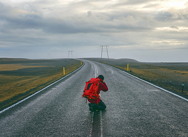 Photographer on the middle of a road