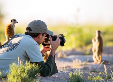 Photographer during a photoshot in the wildernes